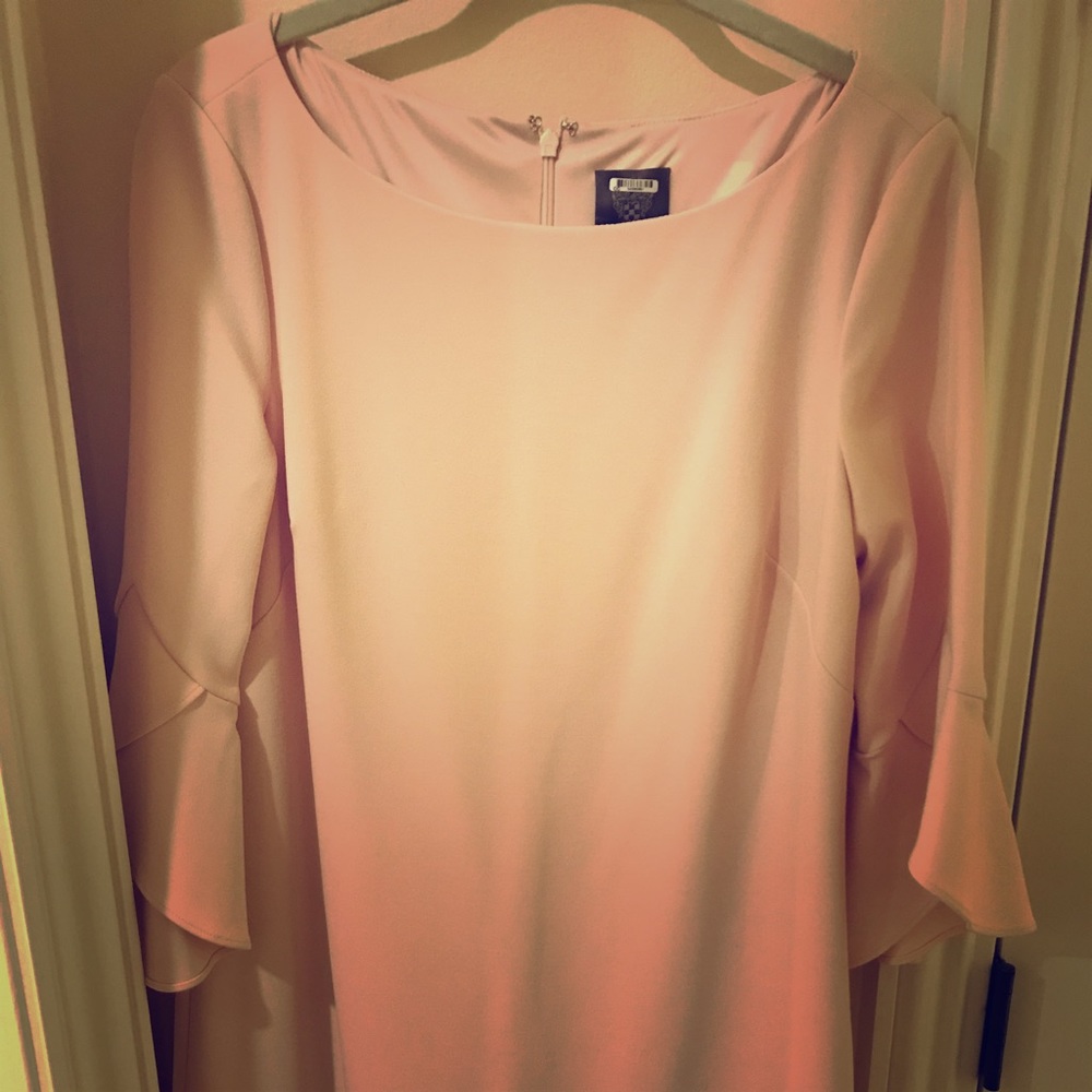 Light pink shift dress with bell sleeves
